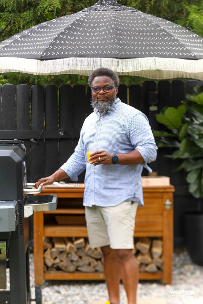 dad at the grill with orange juice