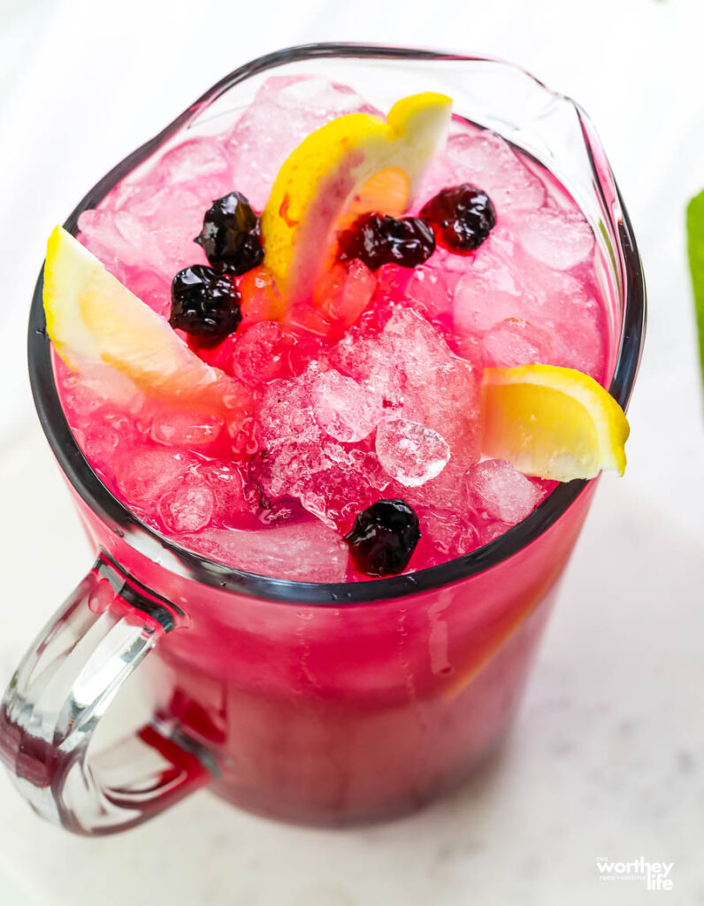 a large pitcher of blueberry lavender lemonade