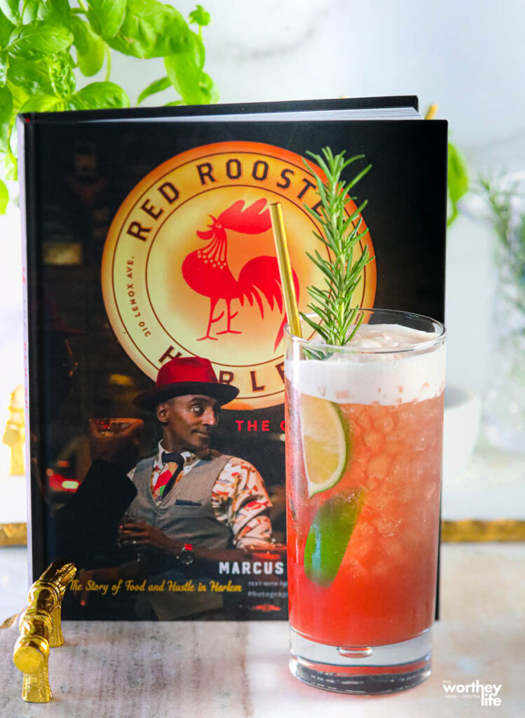 a serving of rum punch and a cookbook
