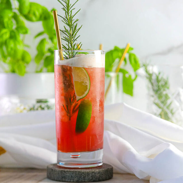 our red hibiscus drink in a tall glass