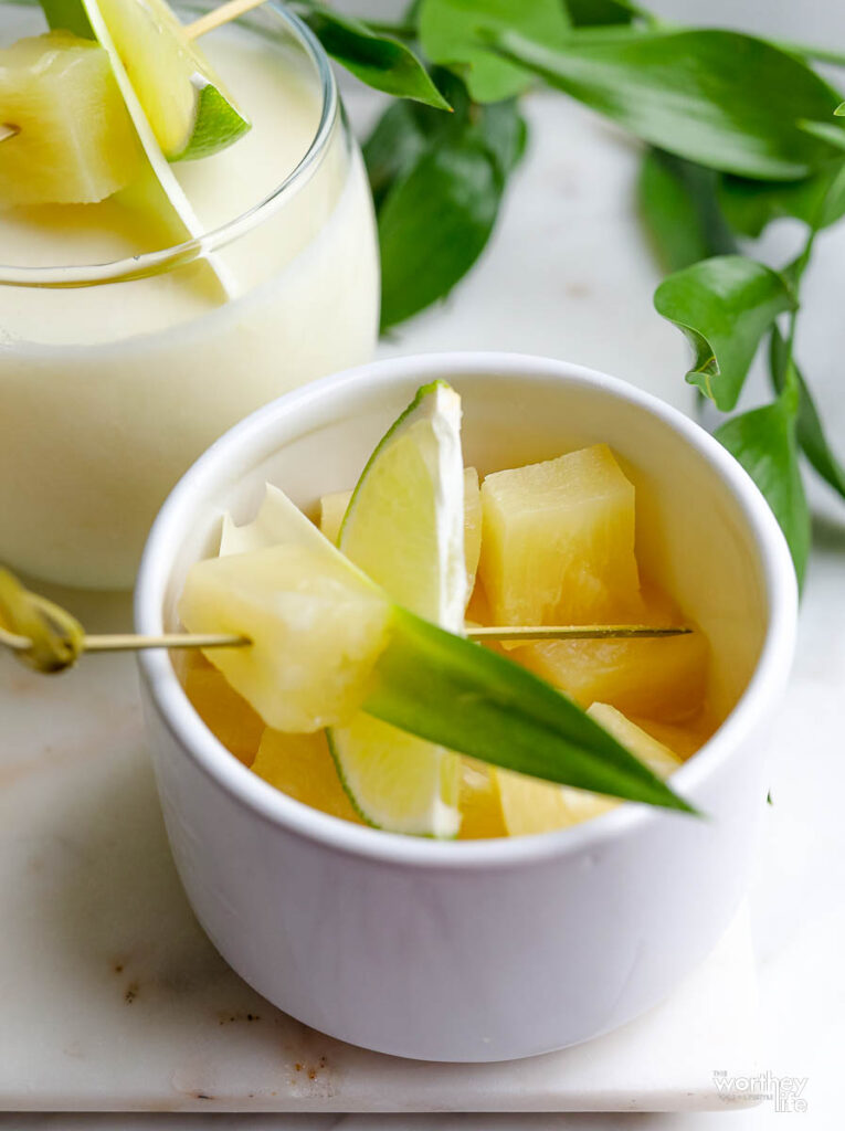 fresh pineapple in a white cup