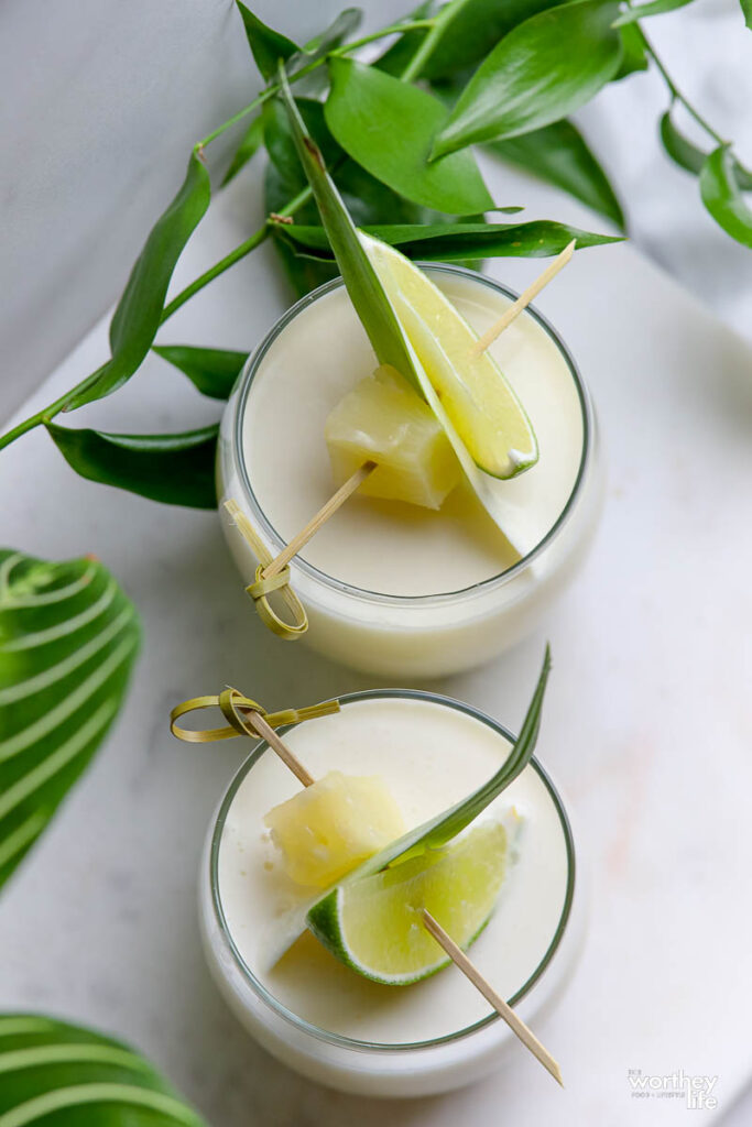 fresh pineapple mocktails in glass cups