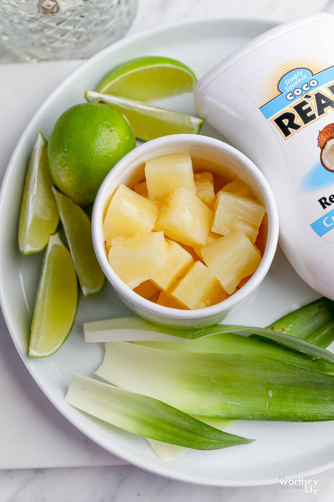 fresh pineapple ingredients on white plate