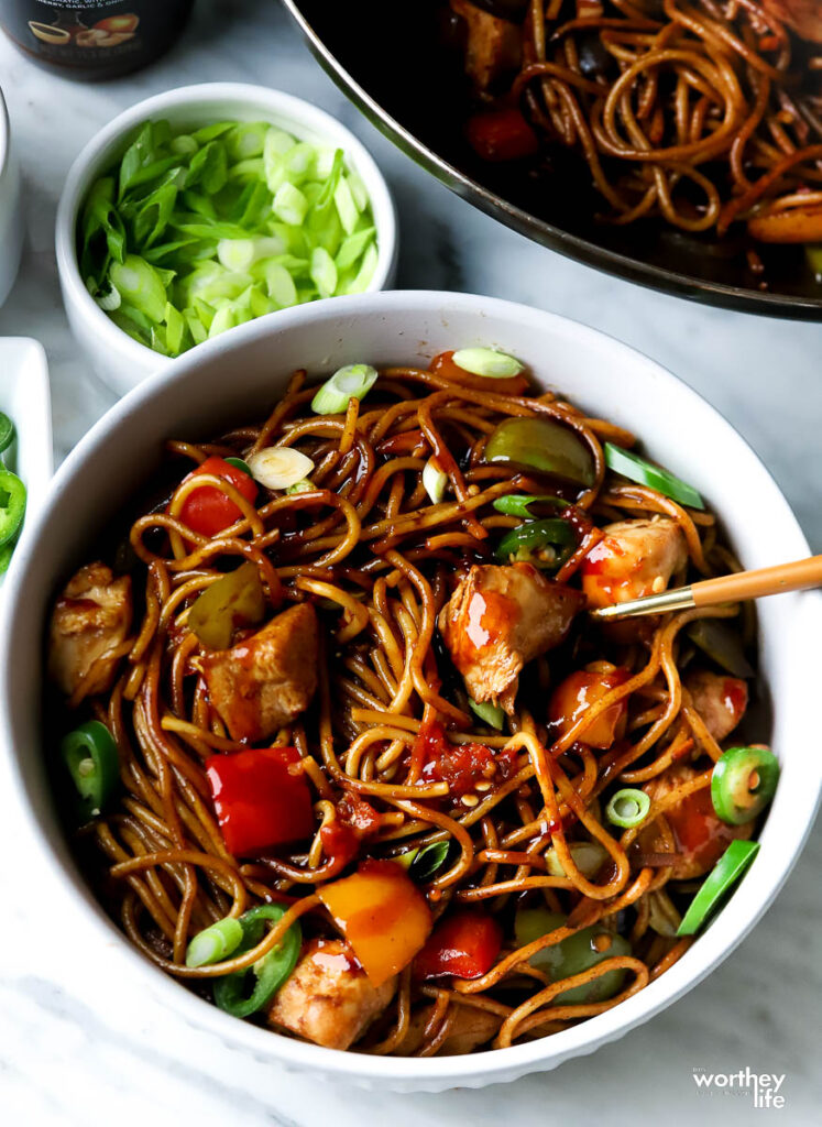 chicken lo mein recipe in white bowl