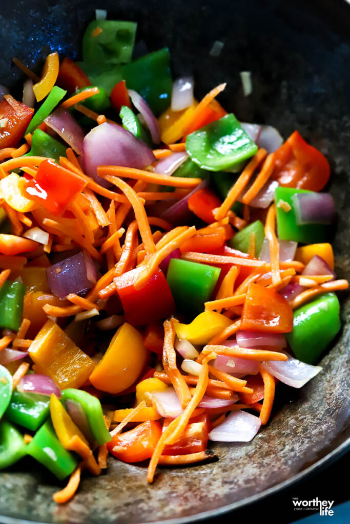 Sauteed assorted vegetables in a work