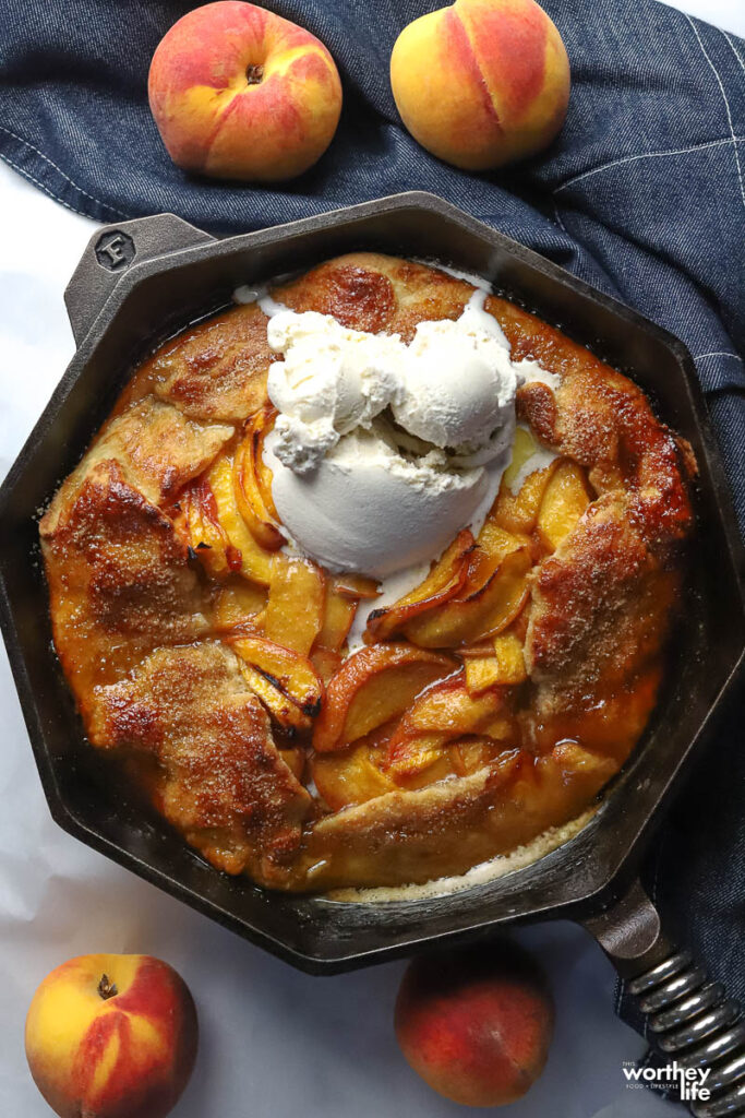 a warm peach galette served with ice cream