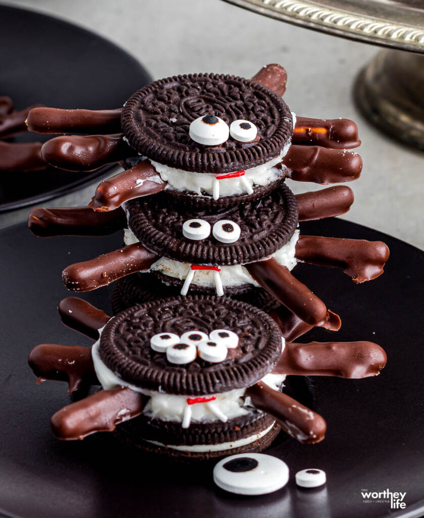 Spider Oreos stacked together with black background