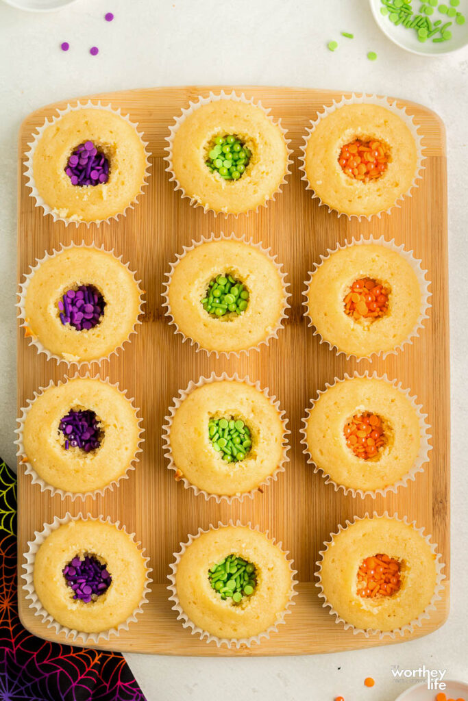 Vanilla Cupcakes with colorful sprinkles inside