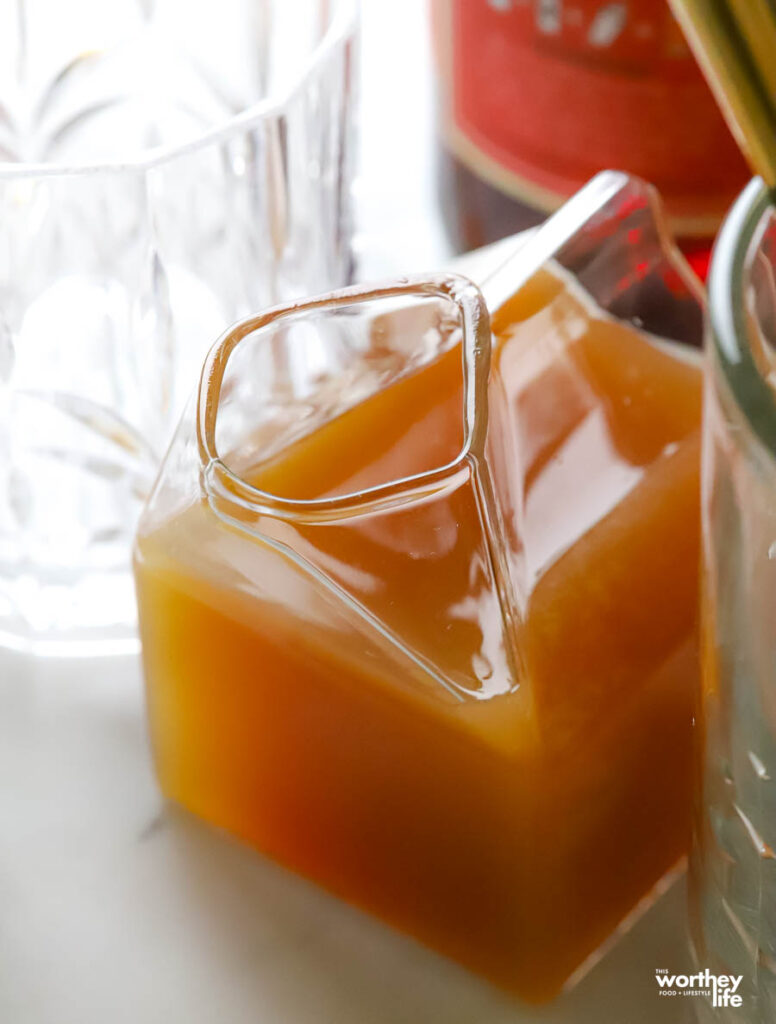 apple cider in glass carton