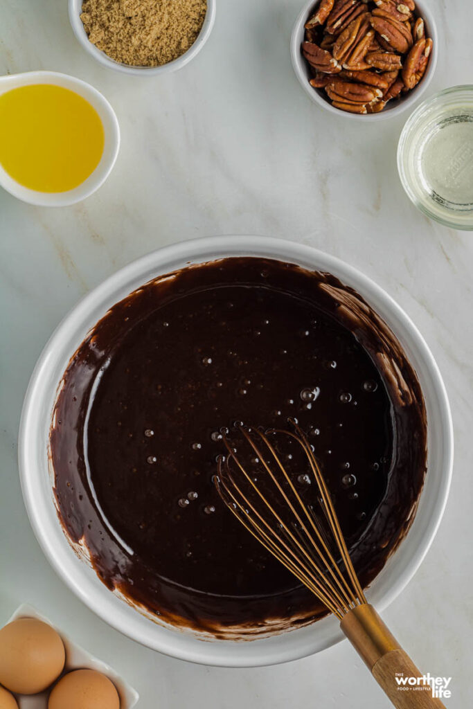 Brownie Batter in a bowl with ingredients for brownies