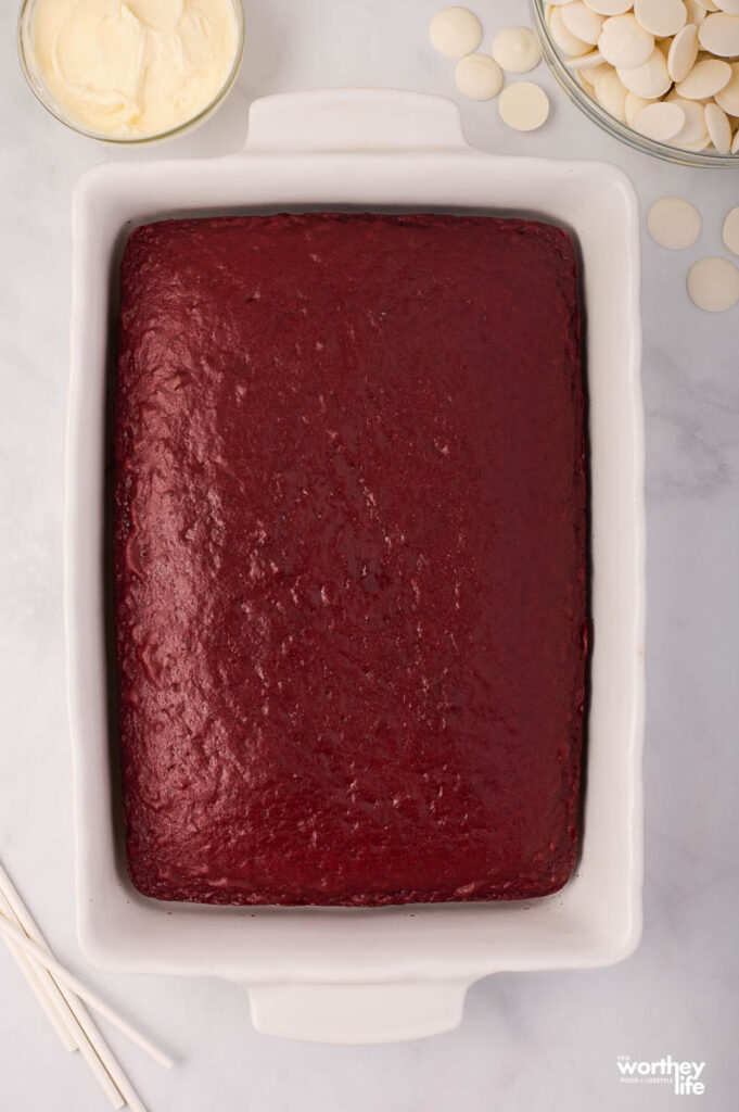 Making a red velvet cake in a cake pan