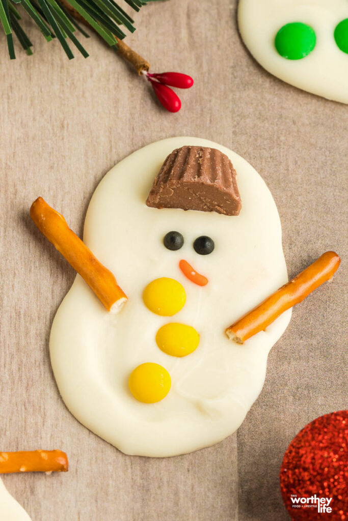 a melted snowman bark on cutting board