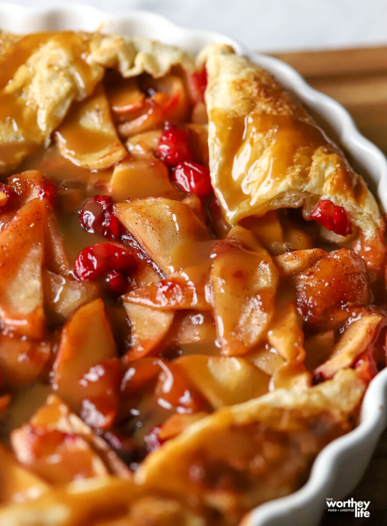 a cranberry and apple galette in a white baking dish