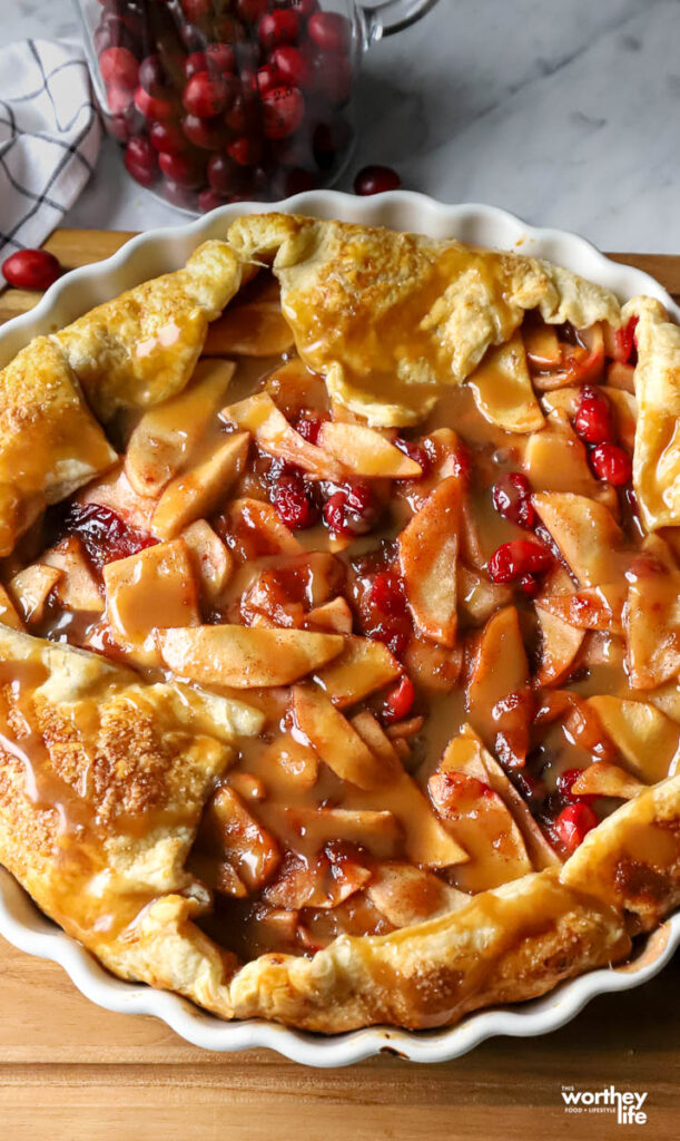 a baked galette with two types of apples and cranberries. 