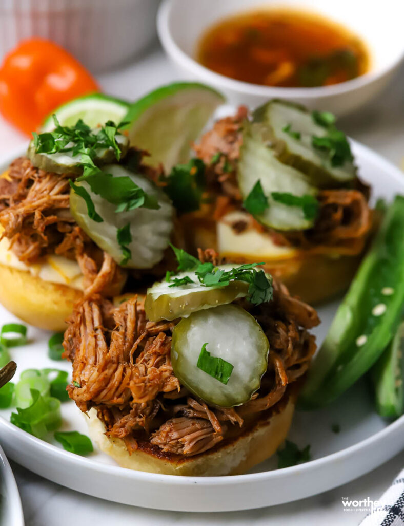 Assembling the pork birria sliders