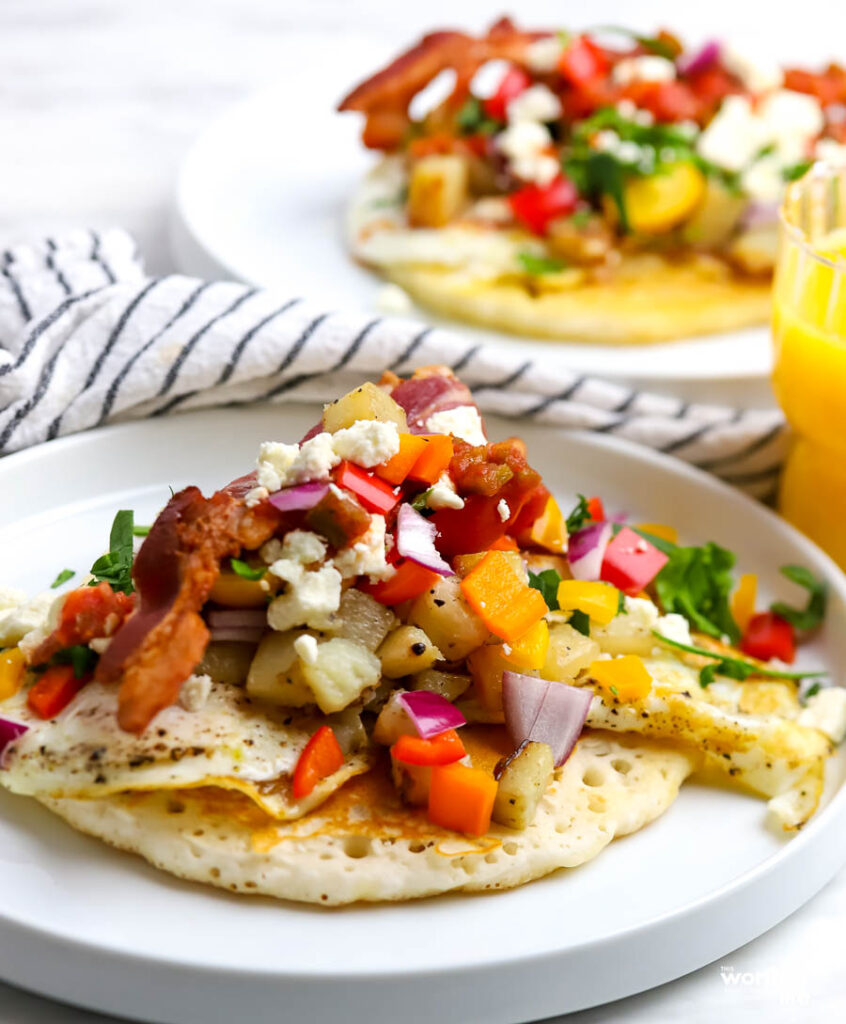 our loaded breakfast pancake taco served on a white plate