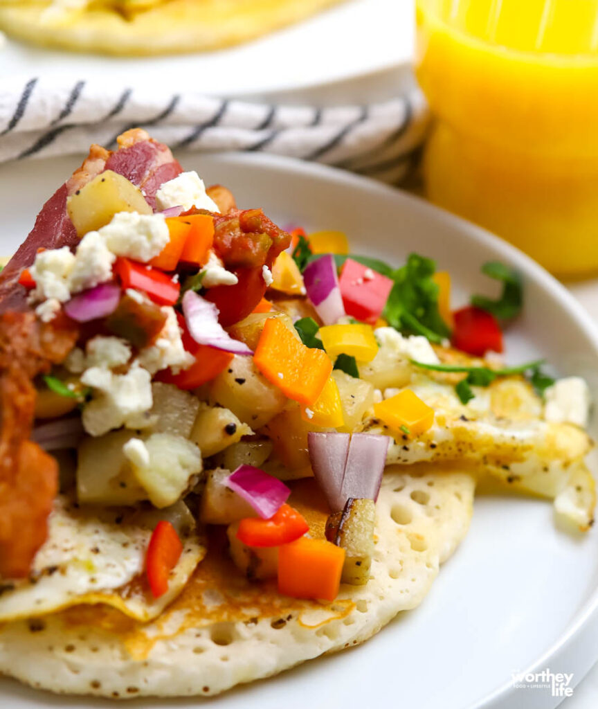 loaded pancake breakfast tacos served with orange juice