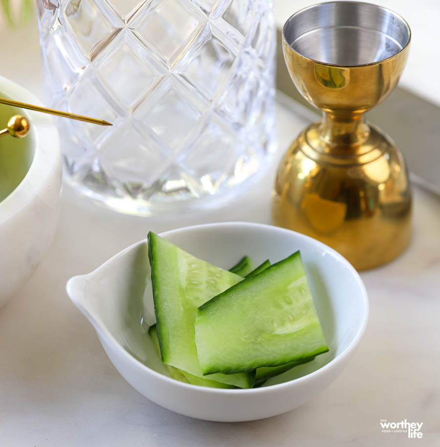 Cut cucumbers in a small white bowl