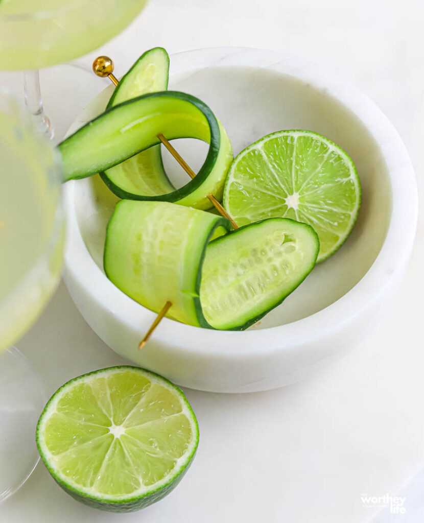 Fresh Cucumbers in a white marble bowl