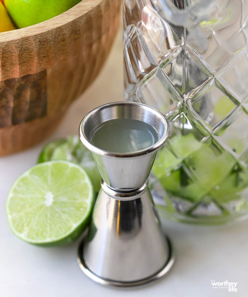 Cocktail ingredients on white marble counter