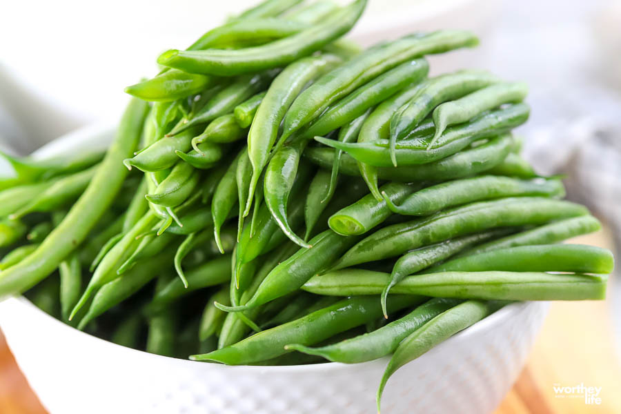 a while bowl filled with fresh French green beans