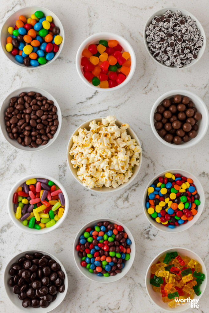 A variety of theater candy on a wooden board