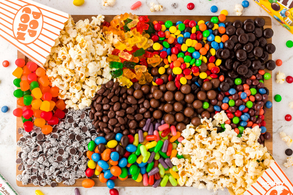 A variety of theater candy on a wooden board