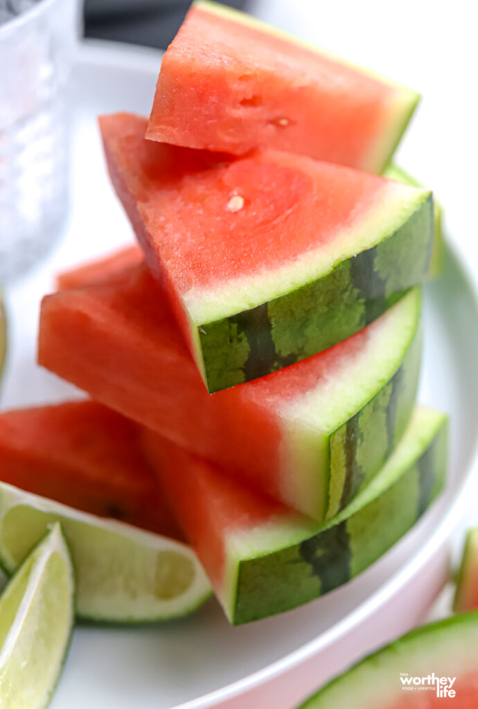 fresh watermelon stacked on top of each other