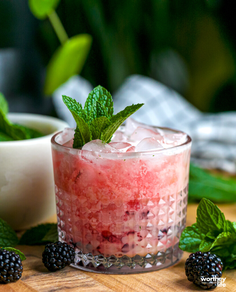 Our blackberry non-alcoholic drink in serving glass. 