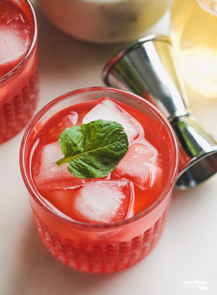 Summer cocktail idea with fresh raspberries and black rum