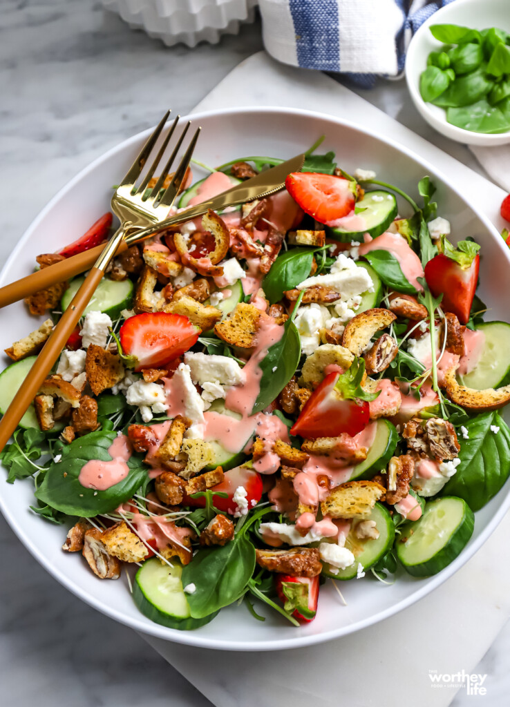 Strawberry Arugula Salad with bagel croutons