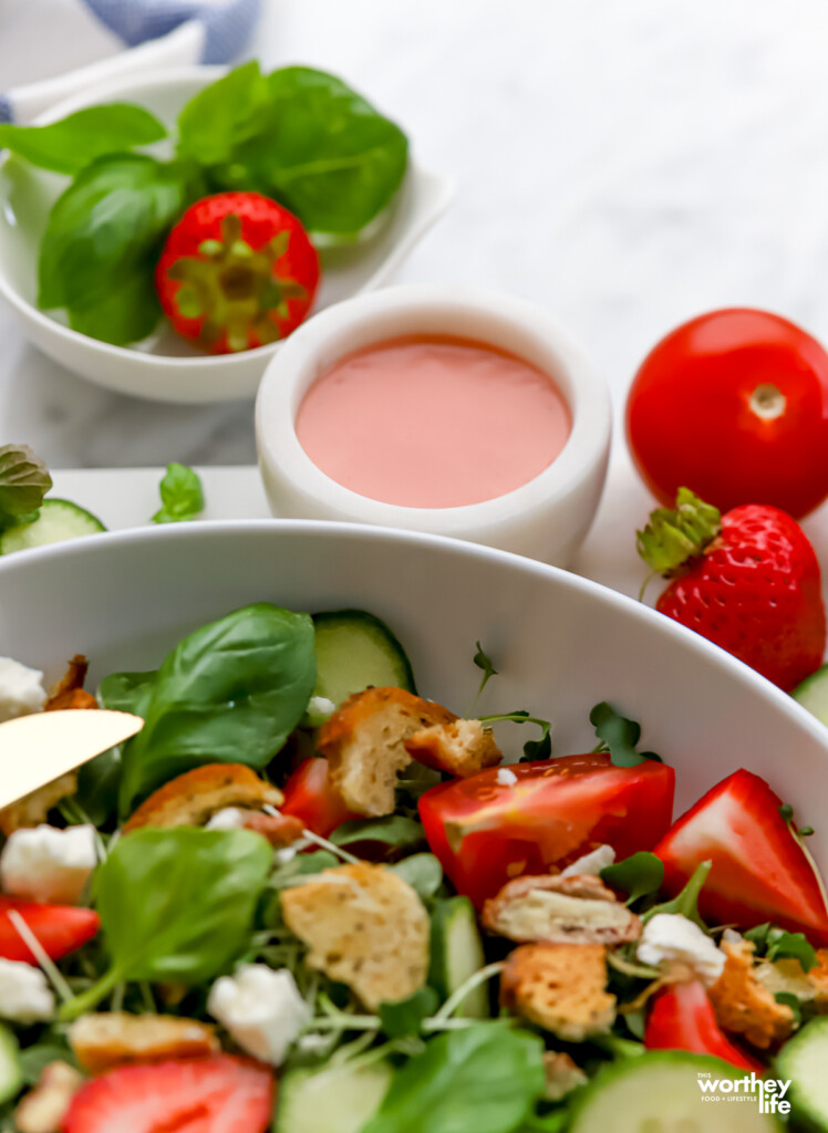 A partial view of our Strawberry Arugula Salad with lots of fresh organic ingredients. 