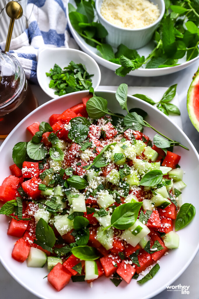 Watermelon salad, with honey, basil, fresh mint, and Cotija cheese.