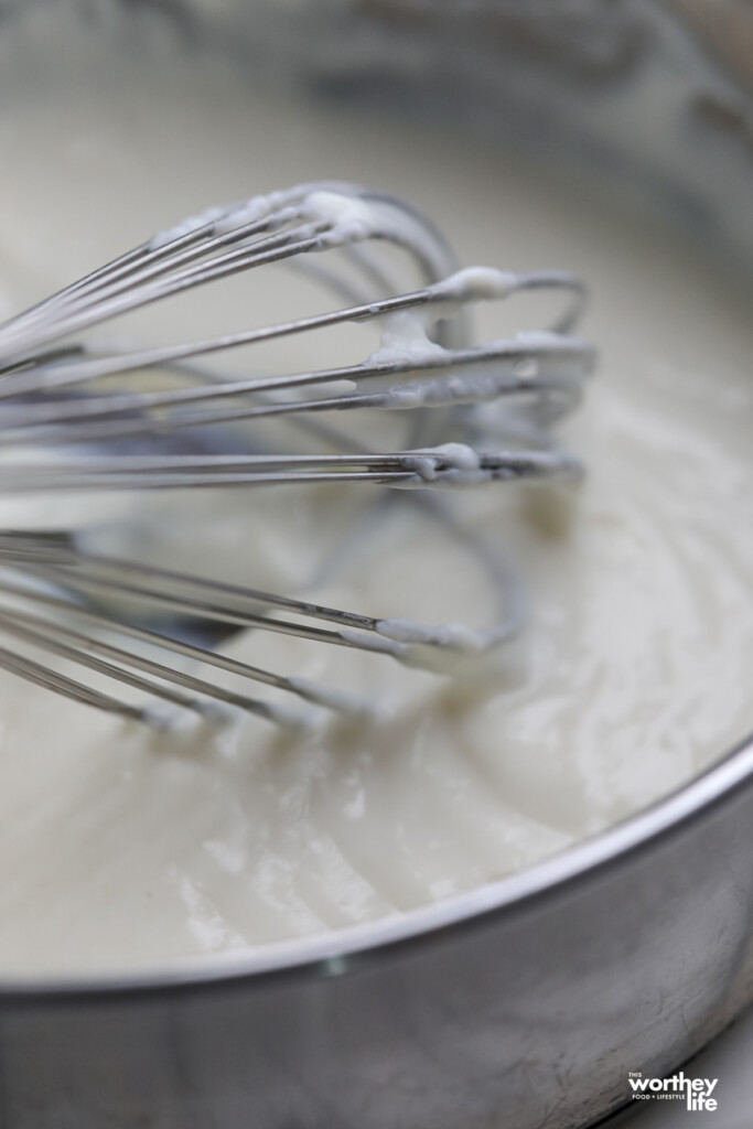 A sauce put with water roux aka tangzhong, mixed with a wire whisk