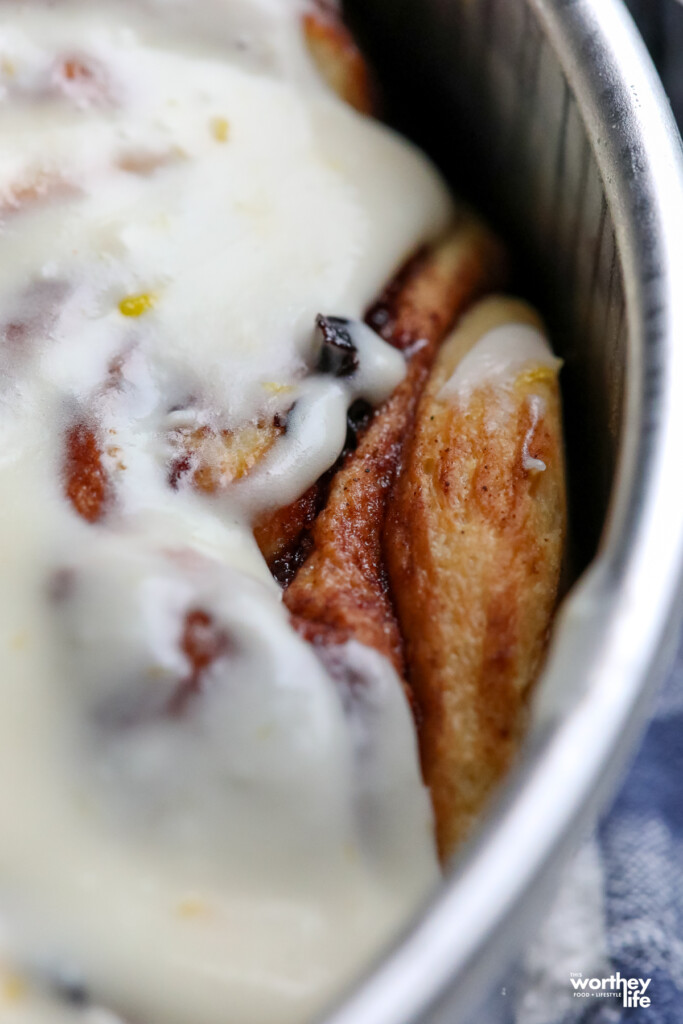 A partial view of our Blueberry Cinnamon Rolls with the lemon cream cheese icing