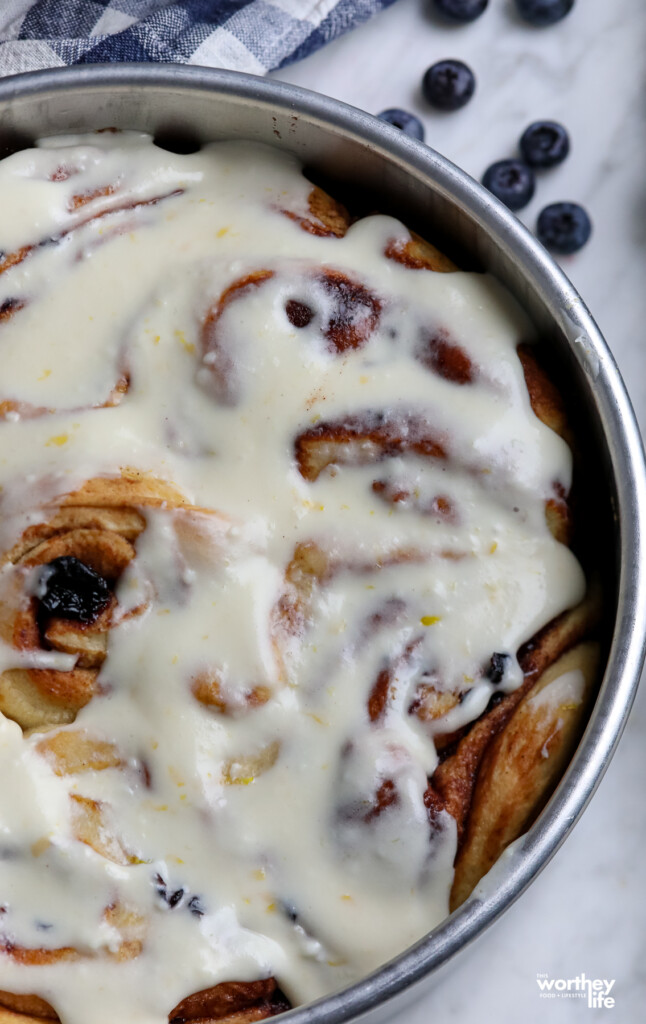 Closeup photo of Blueberry Cinnamon Rolls in baking pan