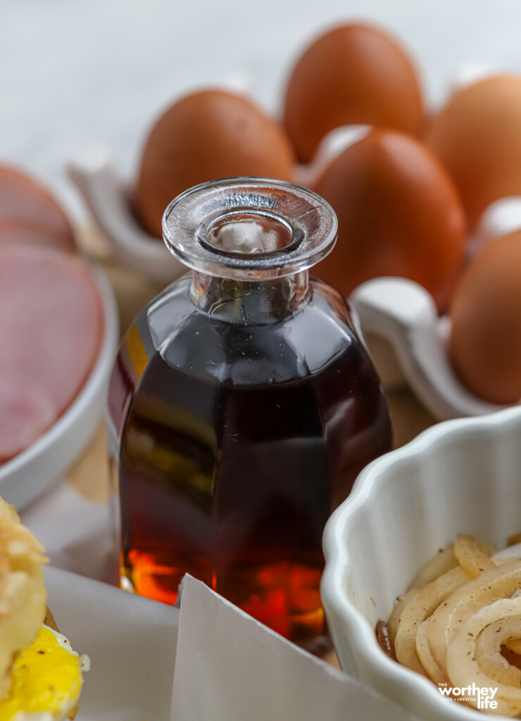 Syrup, eggs, onions, and Canadian bacon are all delicious toppings for a breakfast sandwich.