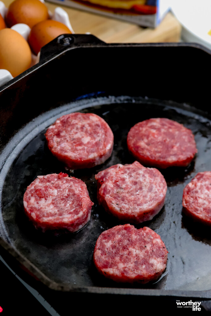 Making breakfast sausage patties in a cast iron skillet. 