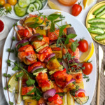 Grilling Salmon Kabobs with fresh veggies