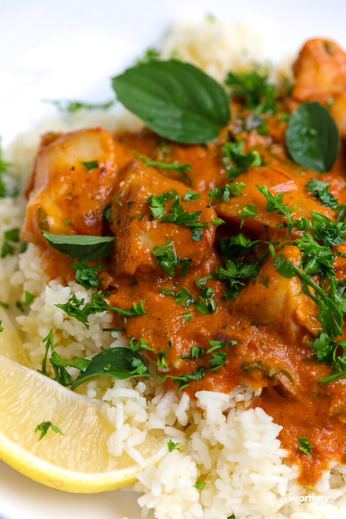 Tomato Stew with cod over rice with fresh lemon