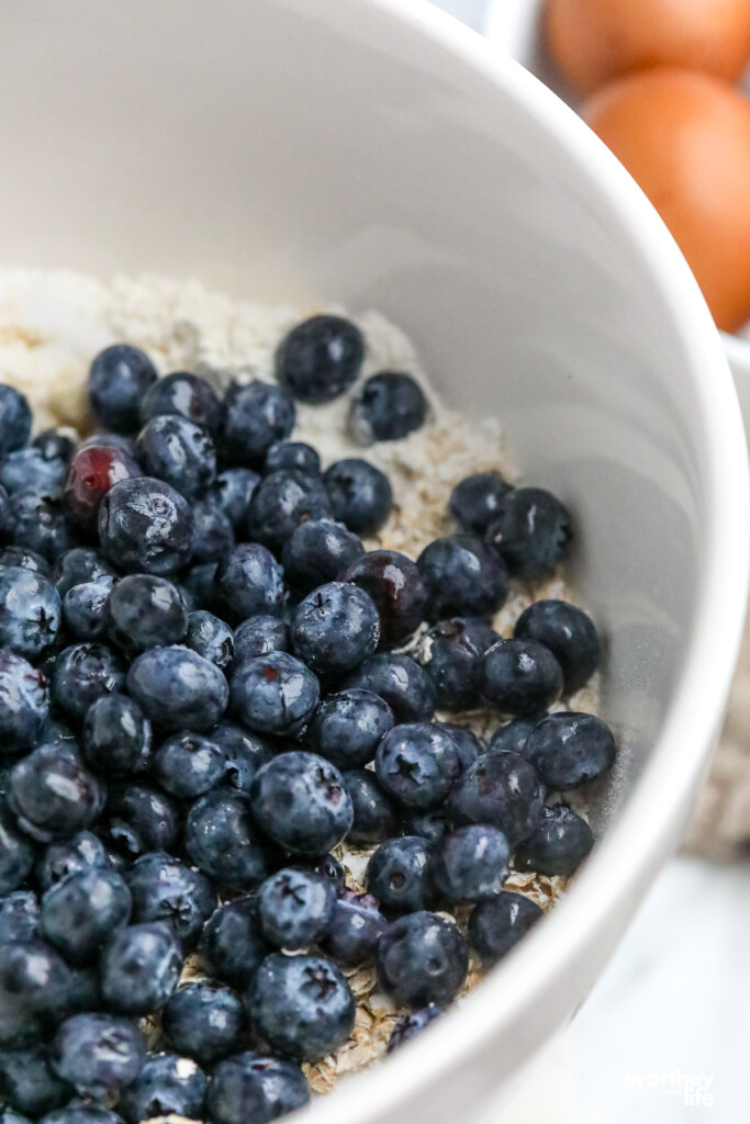 North Bay Produce Blueberries in a large white bowl with additional ingredients. 