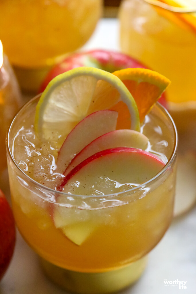 Apple Pie Sangria with fresh sliced apples in glass