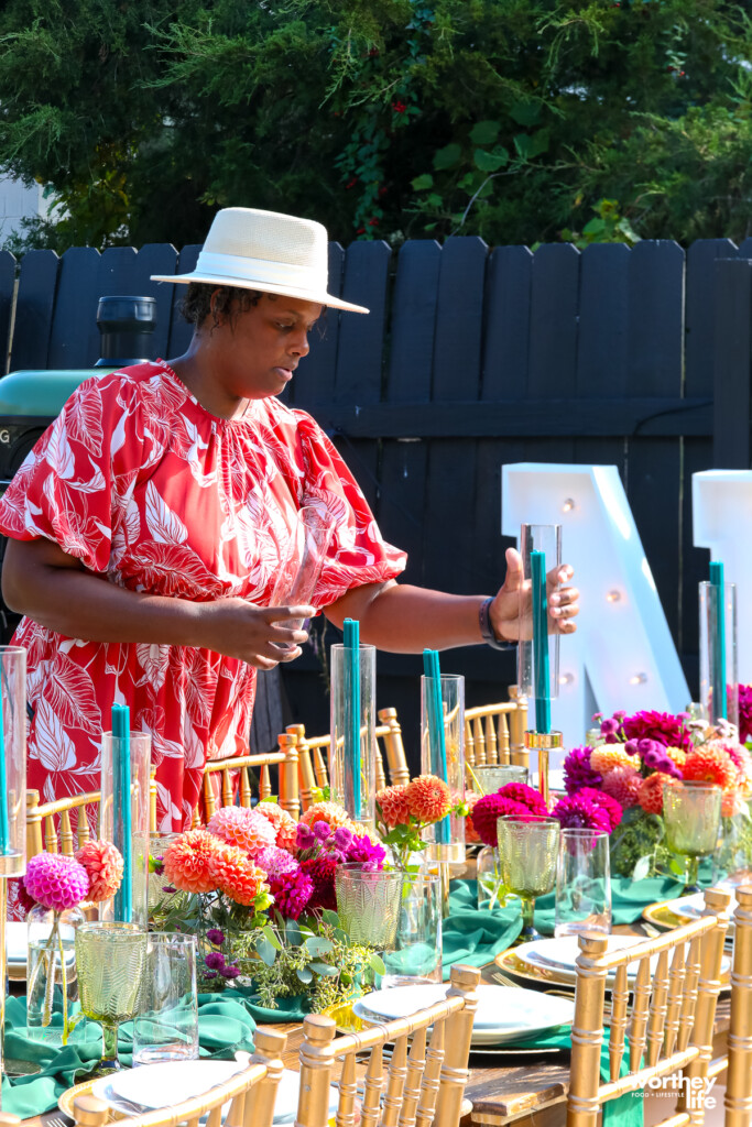 woman putting a tablescape together