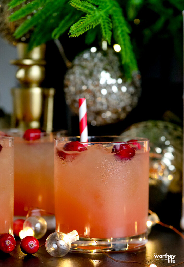 holiday mocktail with cranberries and orange juice