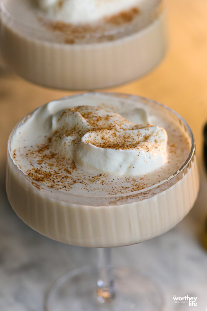 a cocktail made with gingerbread and homemade whipped cream