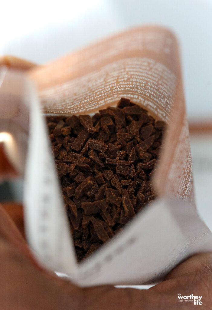 A pouch of chocolate latte flakes in an open package.