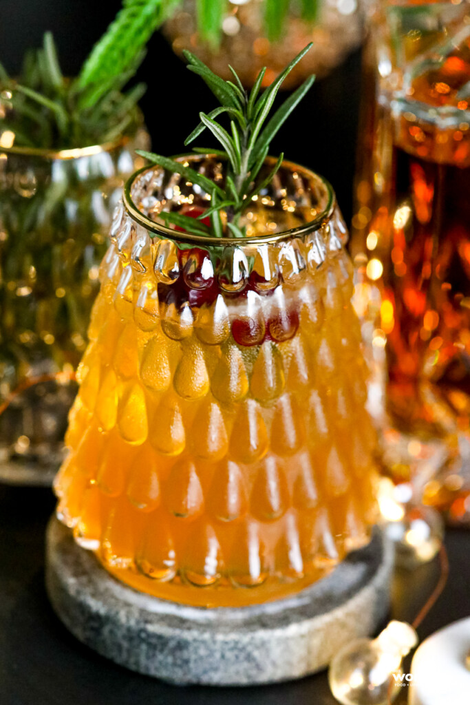 Maple Bourbon Sour holiday cocktail in Christmas Tree glasssware