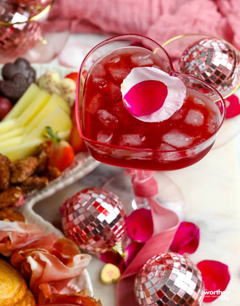 heart shaped glass filled with a mocktail
