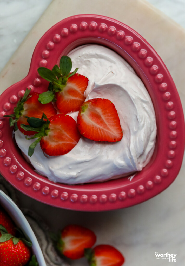 Strawberry Fluff Dip in a heart shaped dish