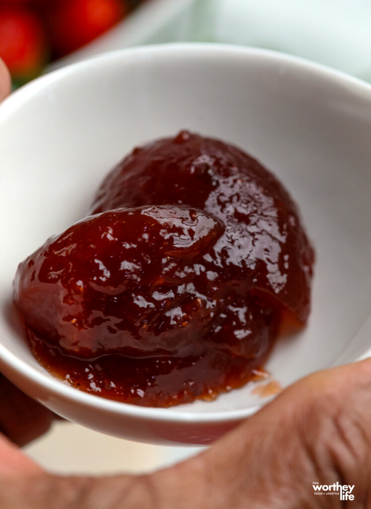 strawberry preserves in a small white bowl